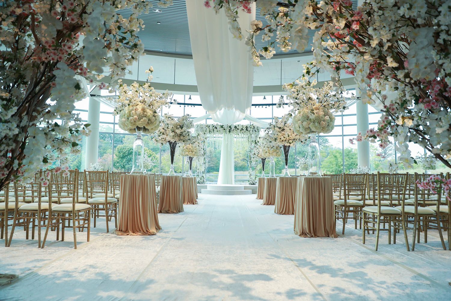 Beautifully decorated ballroom for a wedding ceremony.