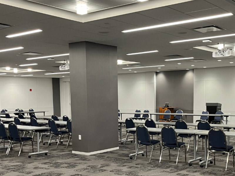 High ceilinged large modern lobby.
