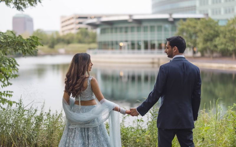 Casual but posed wedding photo of bridal party.